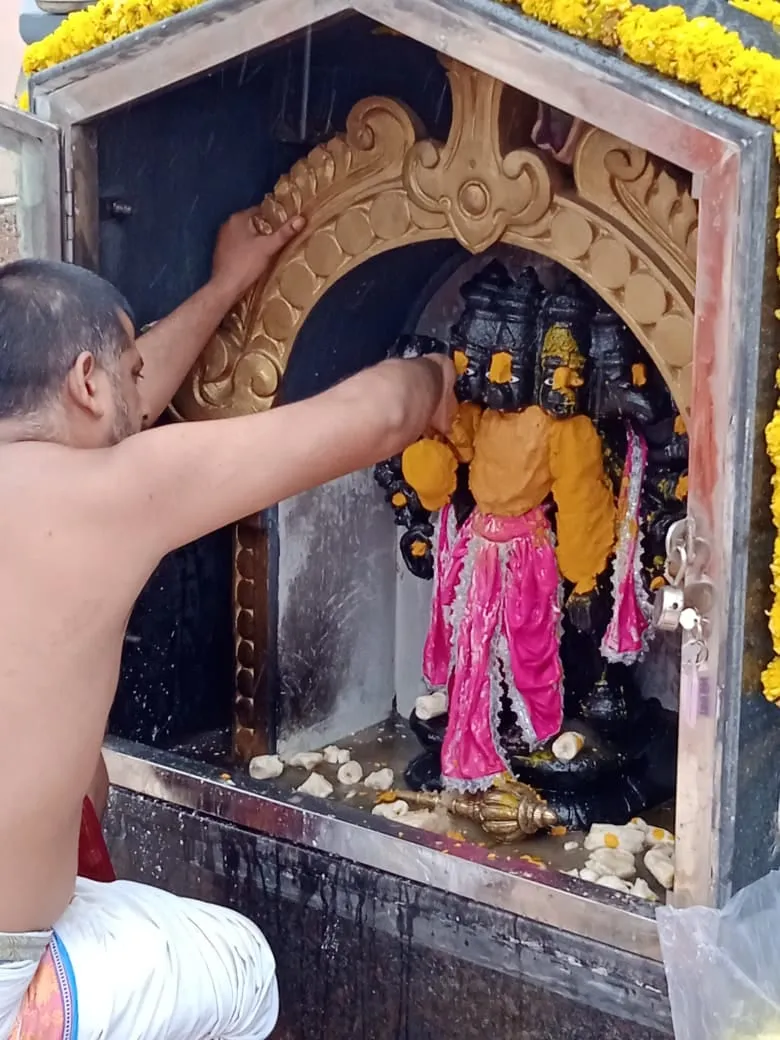 Abhishekam performed for Lord Panchamukhi Anjaneya Swamy at the Kuteer shrine