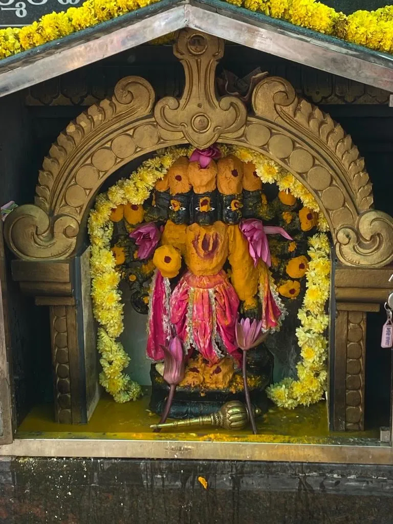 The shrine of Lord Panchamukhi Anjaneya Swamy at the Kuteer, garlanded for his celebration