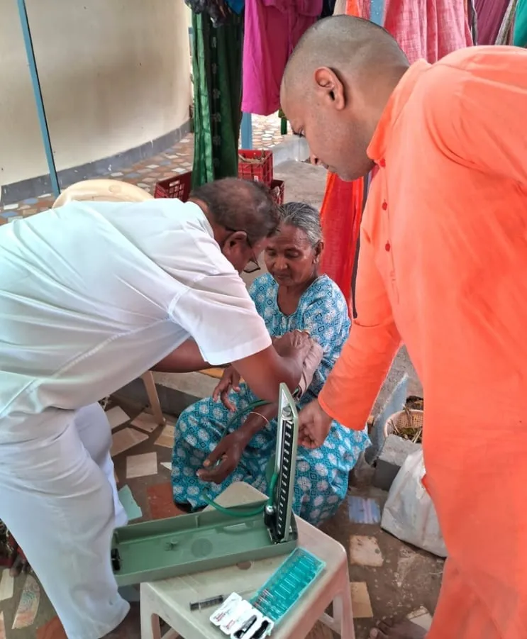 An eye examination carried out with equipment brought to the Kuteer