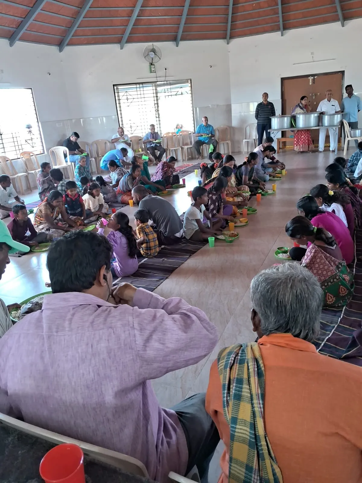 The Kuteer hall during an eye camp, patients waiting to be seen