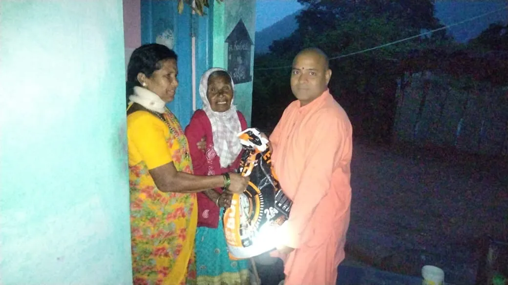 A home visit to a family supported by the Kuteer