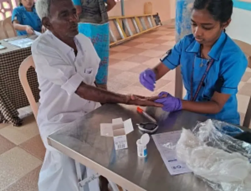 A health check being carried out at the monthly camp