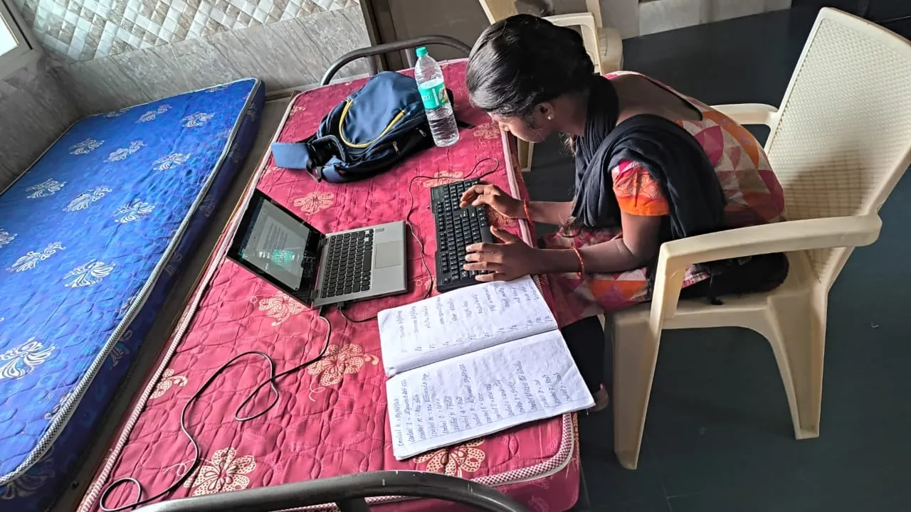 A patient being registered at the medical camp desk