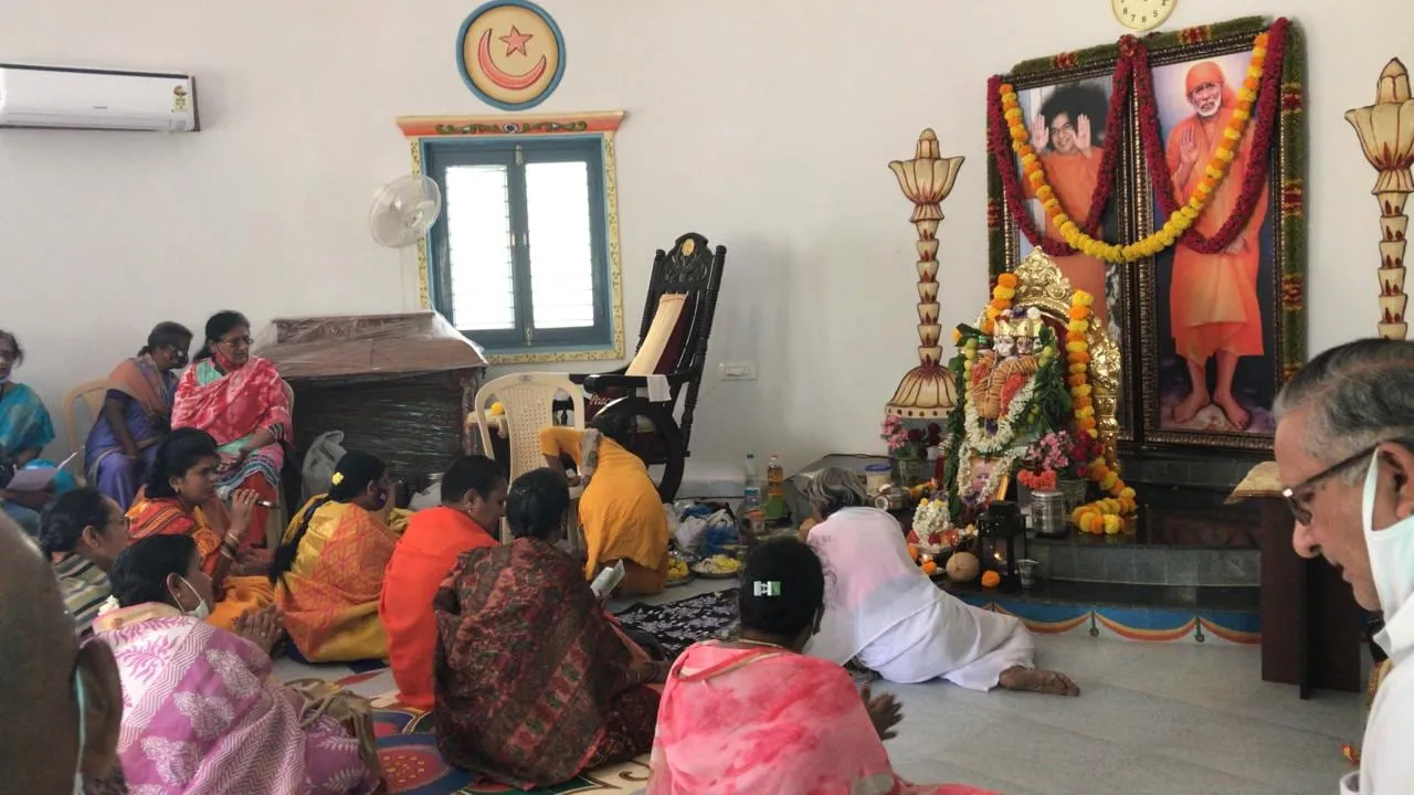 The morning name chanting, before the shrine