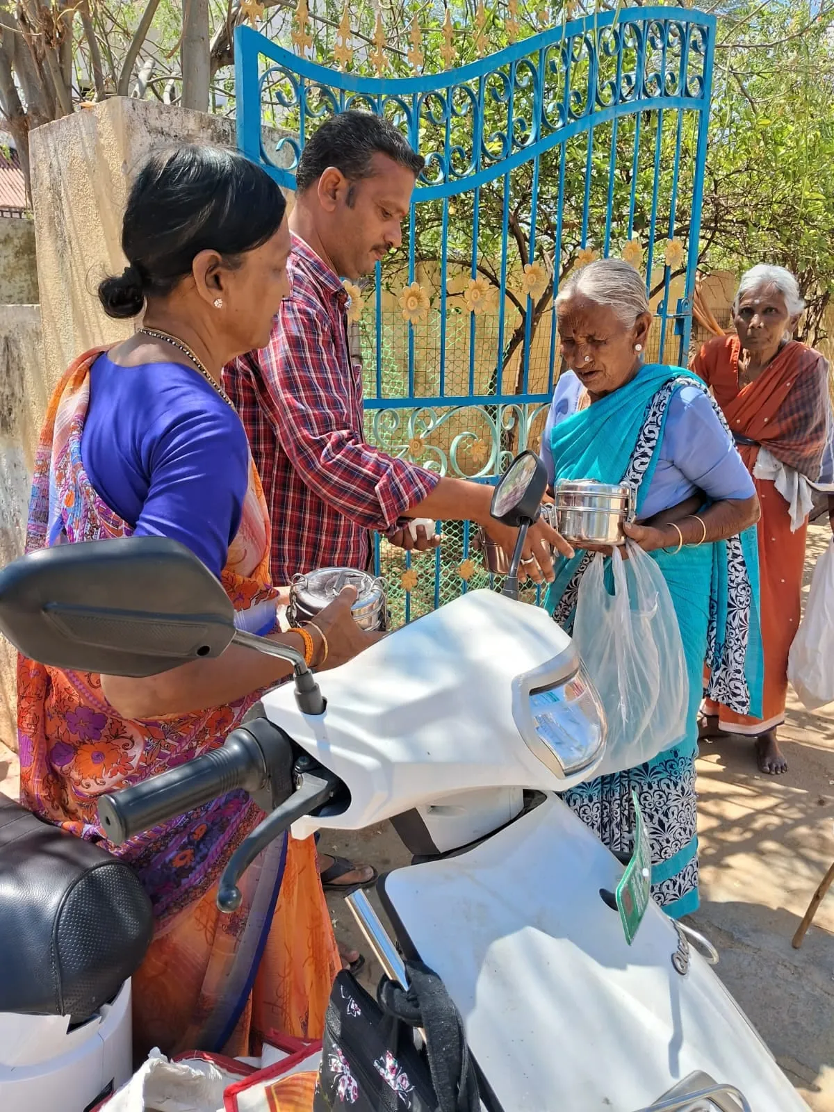 Drinking water being handed over at the collection point